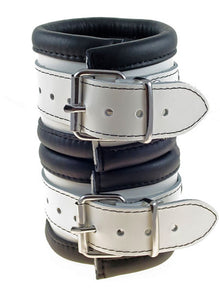 Leder-Handfesseln, schwarz-weiss - 6,5cm